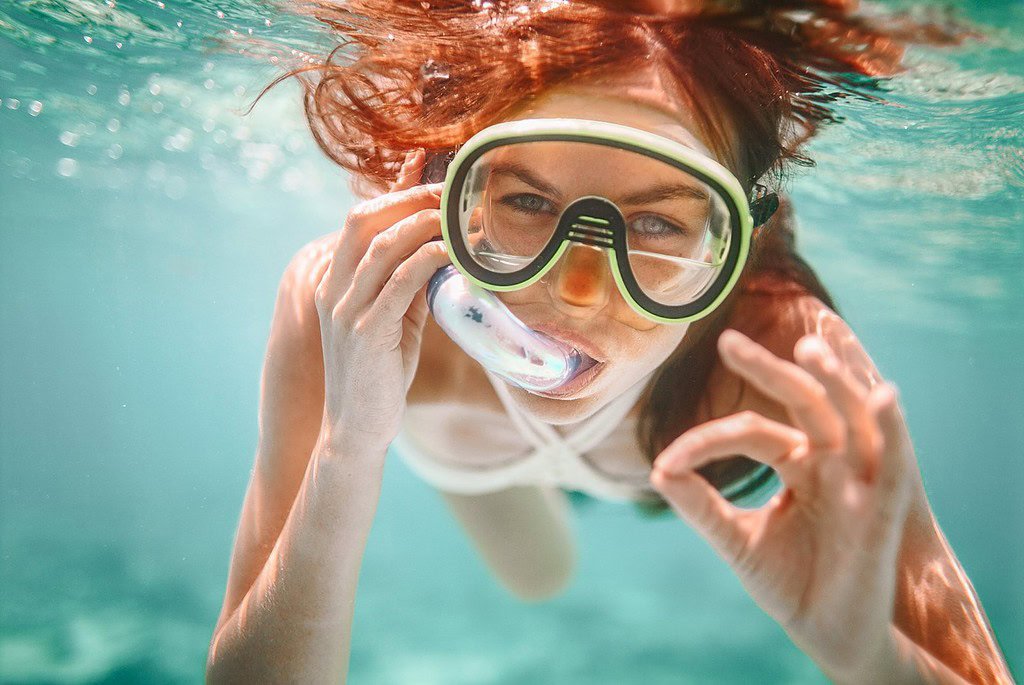 woman packing list - snorkelling - adventure