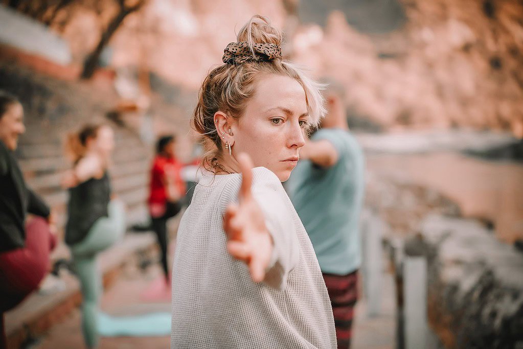 group of people doing yoga