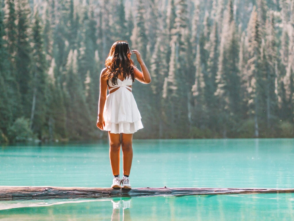 best time to visit canada - summer - woman by the lake